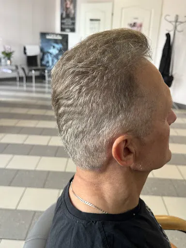 Salon Fryzjerski Pod Papugą